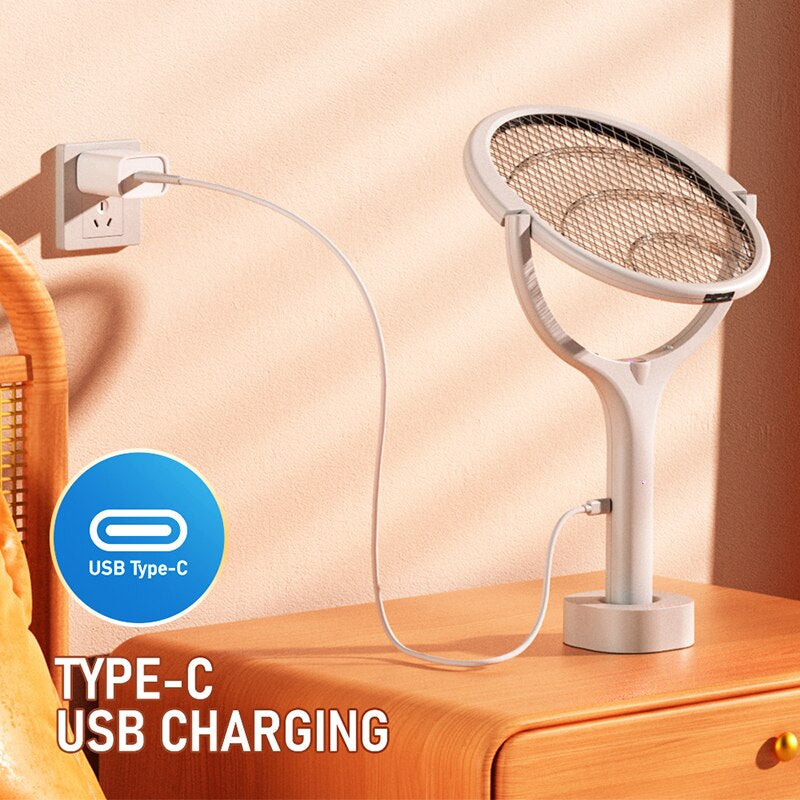 ⚡ 2-in-1 Rotating Mosquito Racket with Lamp